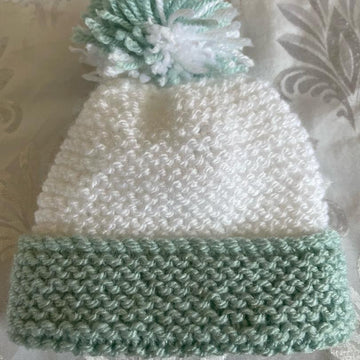 Easy beginner garter stitch flower and pompom baby hat DK knitting pattern