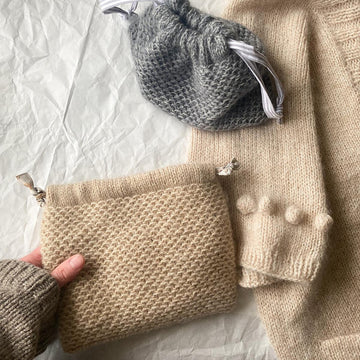 Ruke clutch bag