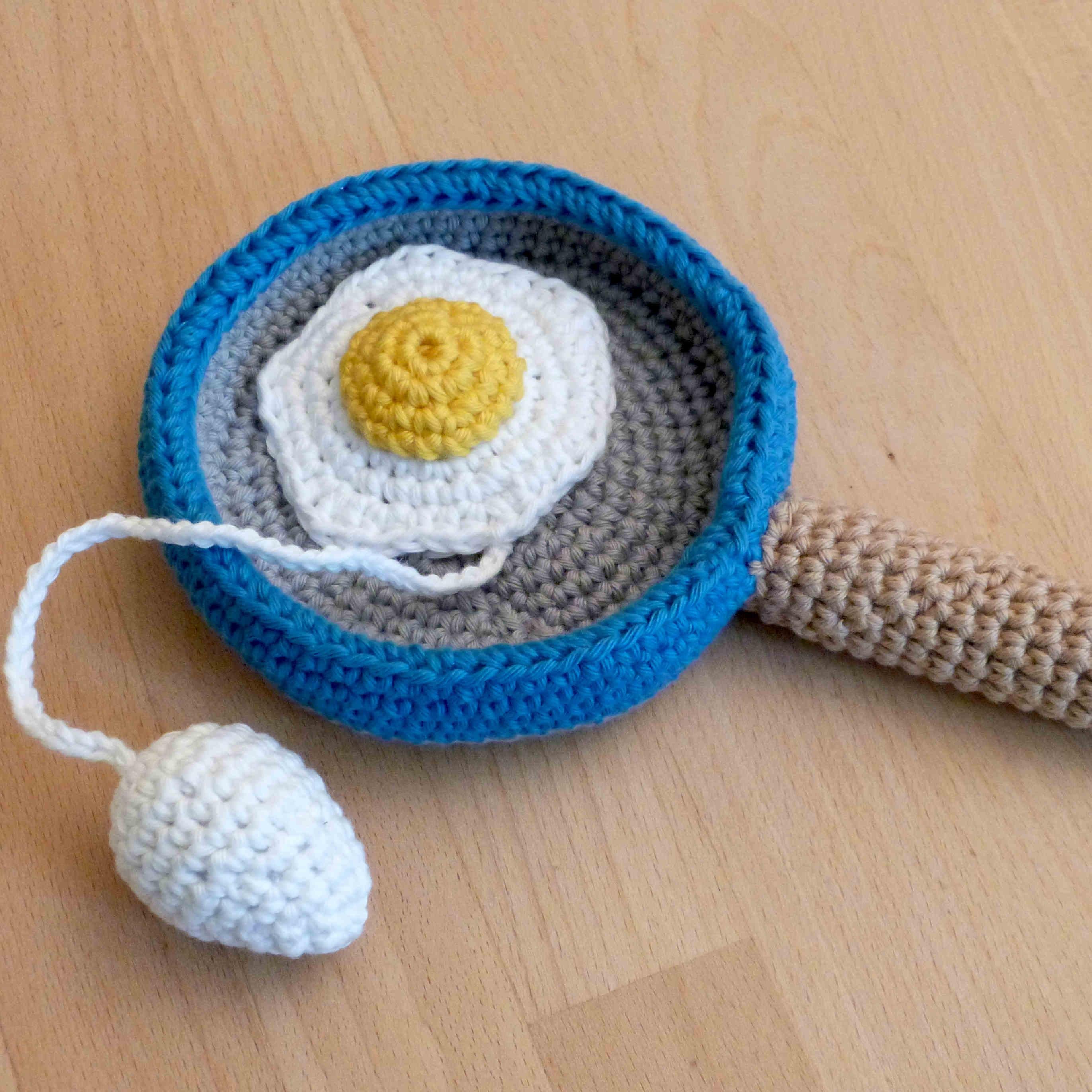 Cup and ball game: pan with eggs