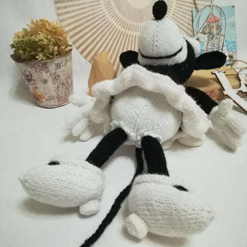 Knitting patterns for Mickey Mouse and Minnie Mouse toys based on Steamboat Willi