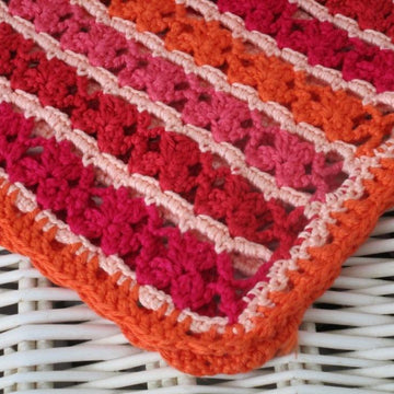 "Simply in red” baby blanket