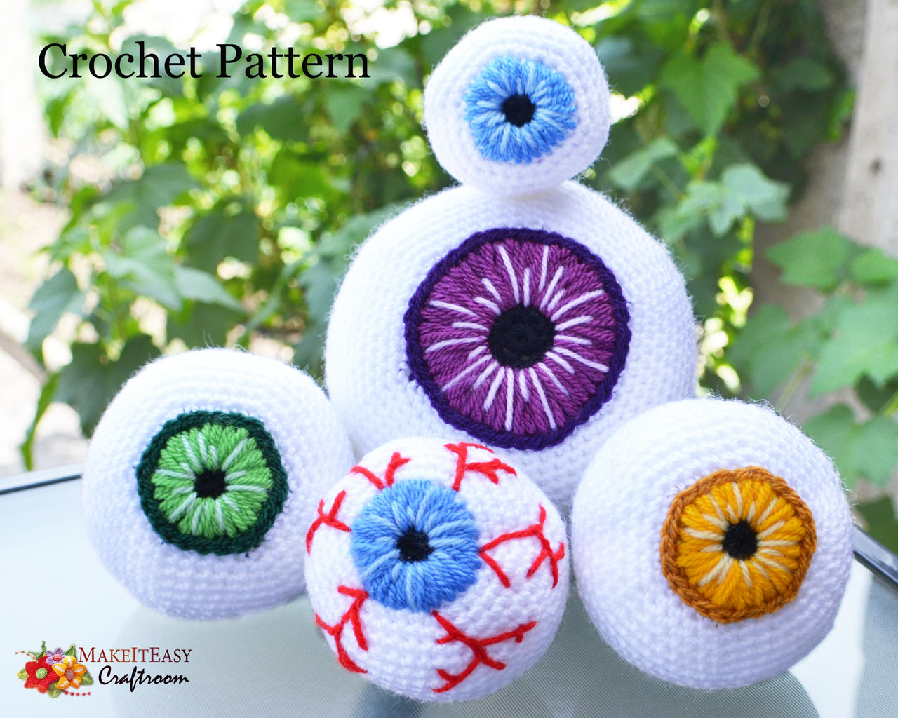 Crochet eyeballs. Creepy eyes. Halloween spooky eyes. Eyeball with blood vessels