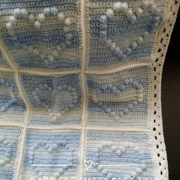 Crochet bobble heart baby blanket