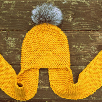 Long Earflap Hat with Faux Fur Pompom