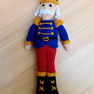 Knitted nutcracker doll