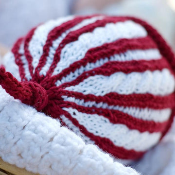 Cabled Tie Topper