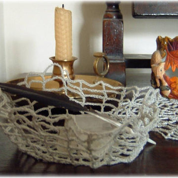 Spider's web doily and bowl