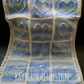 Crochet bobble heart baby blanket