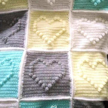 Crochet bobble heart baby blanket