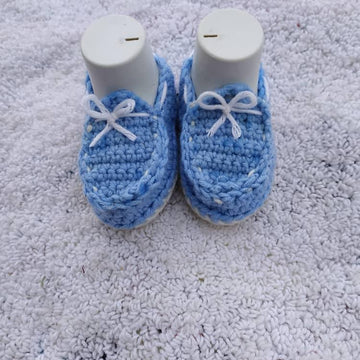 Baby moccasins worked flat