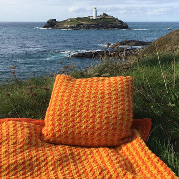 Houndstooth b;lanket and cushion