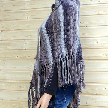 Trendy poncho with fringes