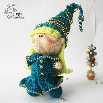 Pebble doll in the Christmas Tree dress