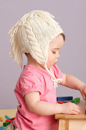 Cabled And Fringed Hat in Lion Brand Superwash Merino Cashmere - L0290AD