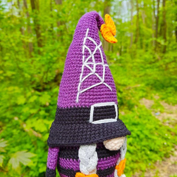 Halloween gnome (girl) with a broom