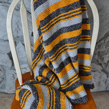 Anteros Throw Blanket