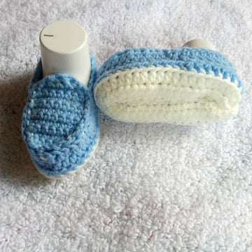 Baby moccasins worked flat
