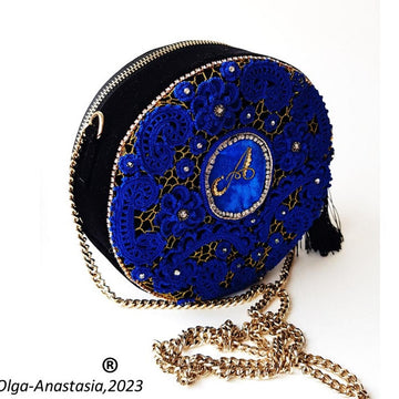 Evening bag round with Irish crochet lace