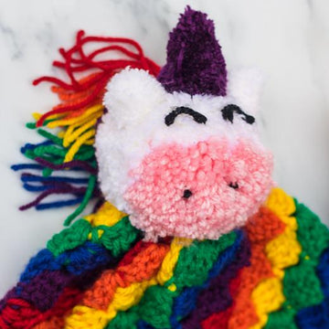 C2C Rainbow Hat with Unicorn Pom Pom