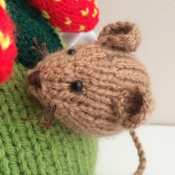 Nature tea cosy. Animal tea cosy .Pesky mouse in the strawberry patch