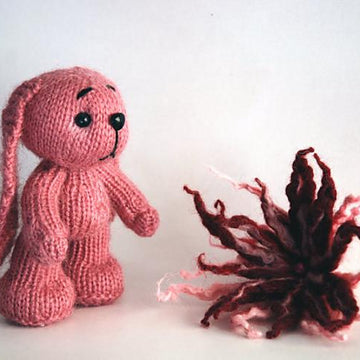 Dusty pink rabbit  (knitted round)