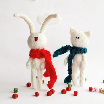 White rabbit in the red scarf and White cat in the dark green scarf