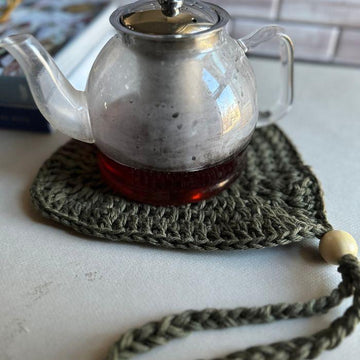 Trivet with strap