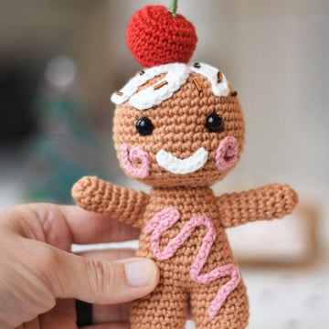 Amigurumi gingerbread with a cherry on top