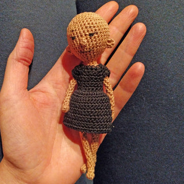 Witch the tiny doll
