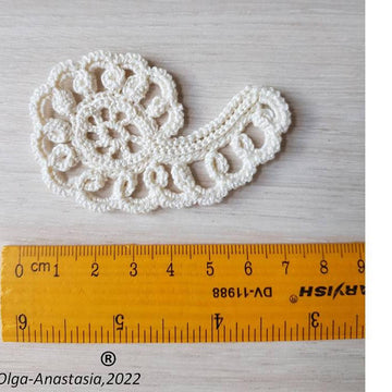 Openwork scroll with arches