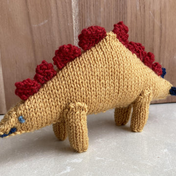 Stegosaurus and Triceratops knitted soft toys