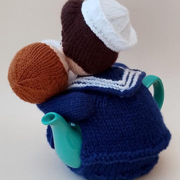 End of the War Kiss Tea Cosy