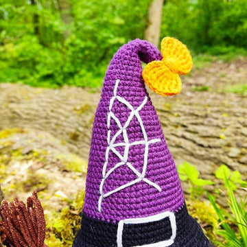 Halloween gnome (girl) with a broom