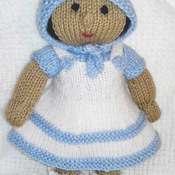 Dressing up baby doll with clothes