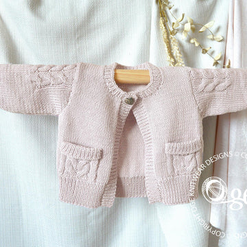 Child’s Cardigan with cable detail on sleeves and pockets - P065