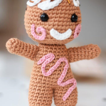 Amigurumi gingerbread with a cherry on top