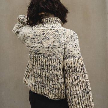 White sheep sweater
