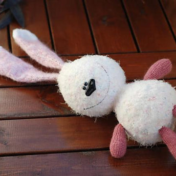 White rabbit with pink ears