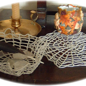 Spider's web doily and bowl