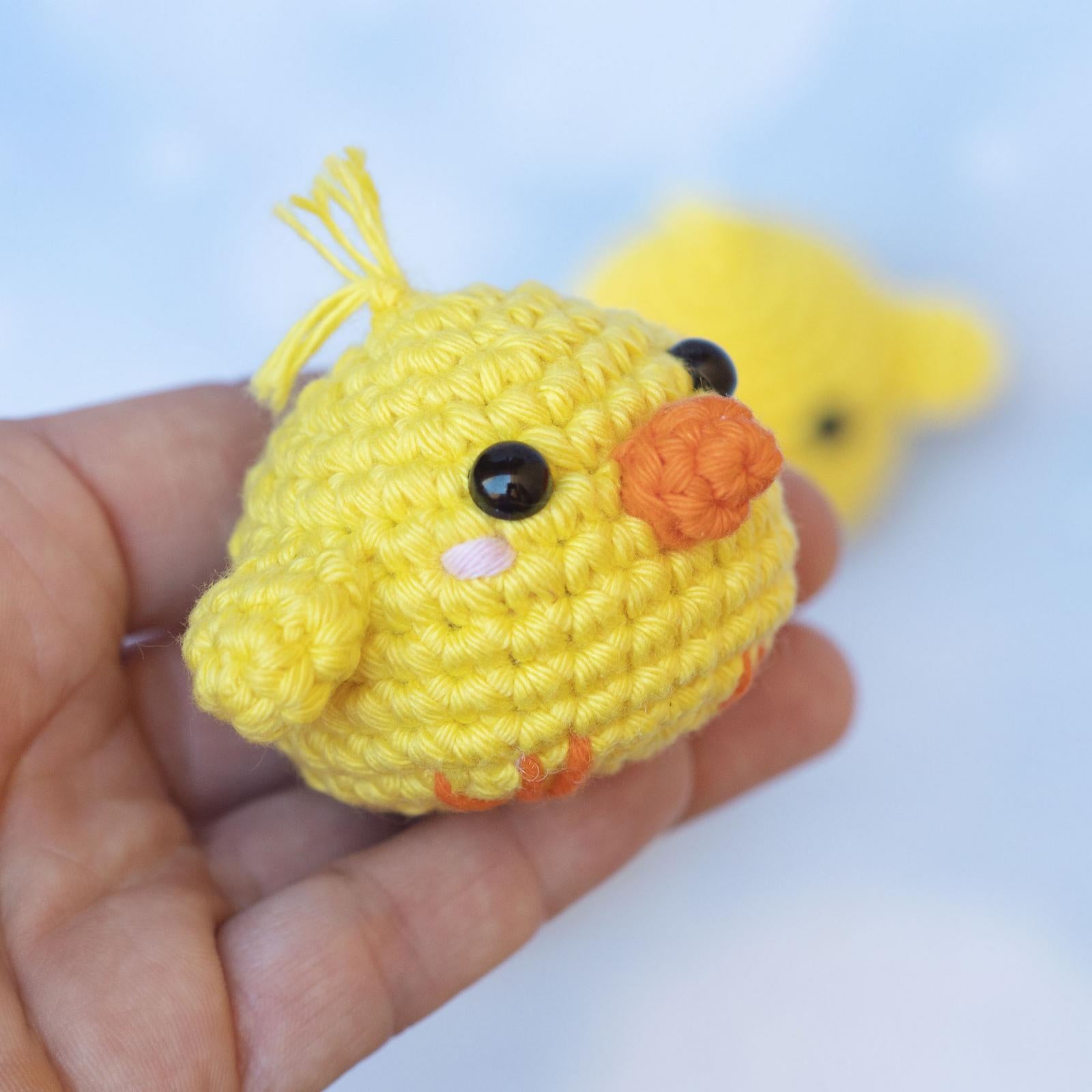 Baby rooster and chick