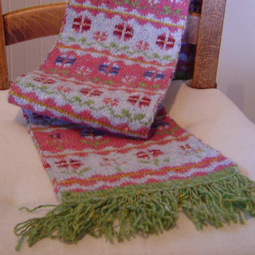 Flowers in winter scarf and hat