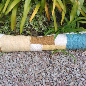 Knitted patchwork cushion, footstool, draught excluder, rug, living room collection
