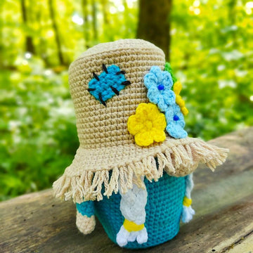 Gnome (girl) in a straw hat