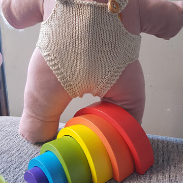 Knitted dolls romper