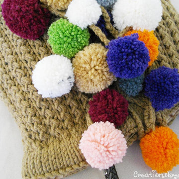 Large tote with colorful pom poms