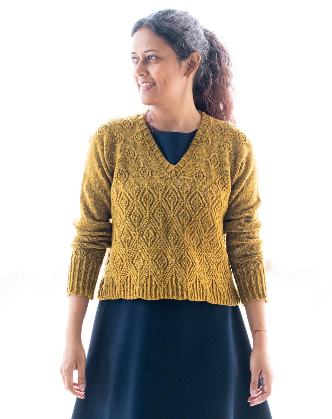 Dharā Pullover