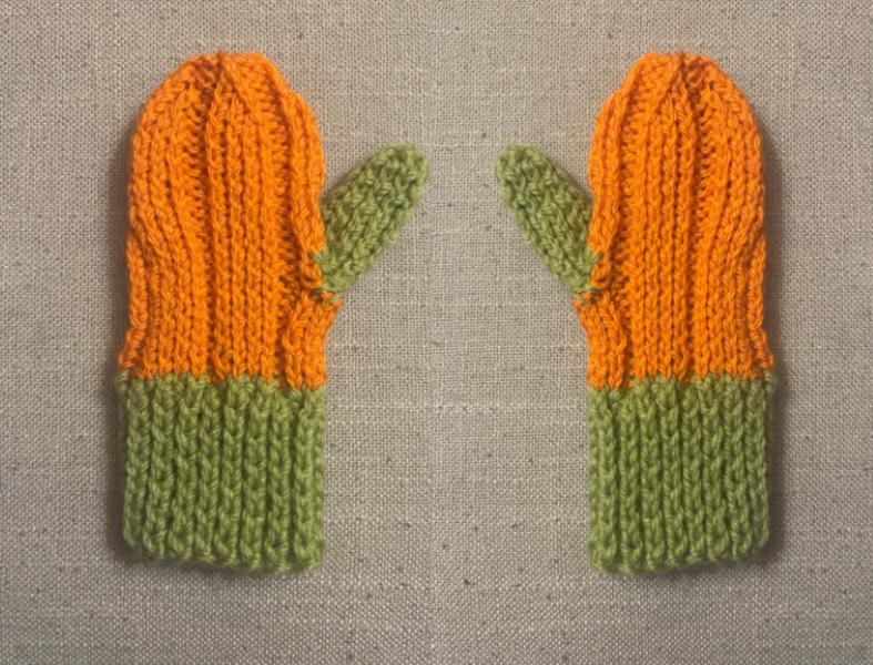 Knitted pumpkin mittens