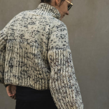 White sheep sweater
