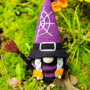 Halloween gnome (girl) with a broom
