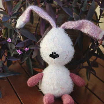 White rabbit with pink ears